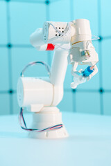 Robot hand with a medical syringe. Future medicine concept using robots and artificial intelligence