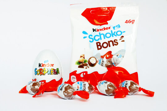 Italy &ndash; April 6, 2022: Kinder Surprise Chocolate Eggs and Schoko-Bons. Kinder is a brand of food products of Ferrero