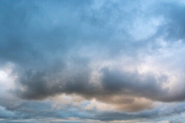 Naklejka na ściany i meble Beautiful colors in the impressive clouds above the Normandy coast 2