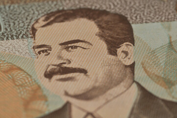 depiction of Saddam Hussein on Iraqi dinars - obrazy, fototapety, plakaty