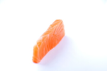 a slice of raw salmon sashimi sushi japanese food close-up sliced ​​isolated on white background