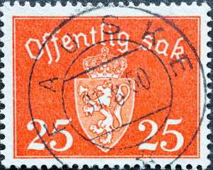 Norway - circa 1946: a postage stamp from Norway , showing the coat of arms of Norway with a crown....