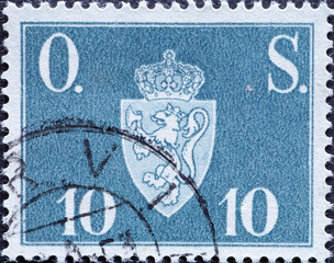 Norway - circa 1951: a postage stamp from Norway , showing the coat of arms of Norway with a crown....
