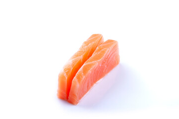 two pieces of raw salmon sashimi sushi japanese food close up cut angle isolated on white background