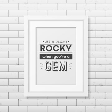 Life is Always Rocky. Vector Typographic Quote, Simple Modern White Wooden Frame on Brick Wall. Gemstone, Diamond, Sparkle, Jewerly Concept. Motivational Inspirational Poster, Typography, Lettering