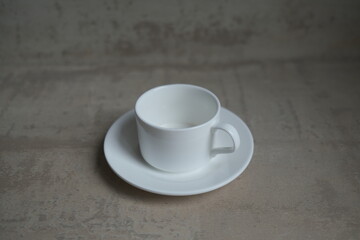 Obraz na płótnie Canvas Empty white coffee cup with saucer. High quality photo