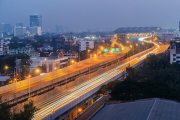 Bangkok with light paths on Sathorn Road in the heart of Bangkok's central business district. Bangkok at sunset