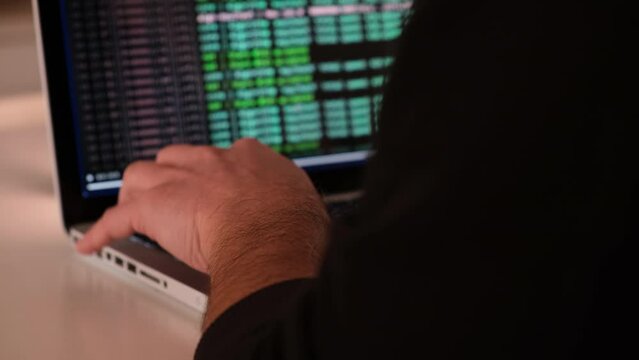 An anonymous haker program on a laptop