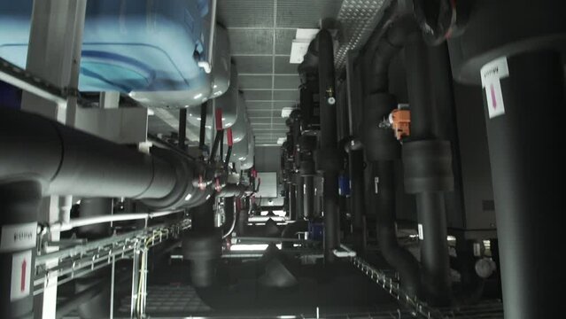 Data center server room, Switchgear room with raws of cabinets with network or cellular hardware. Electrical energy distribution substation in a new factory plant, Industrial electrical switch panel
