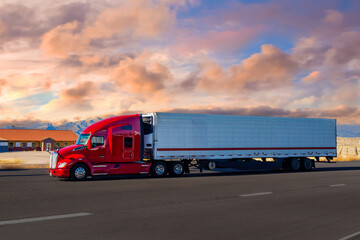 Fototapeta na wymiar Semi Trucks on the Nevada Highway, USA. Trucking in Utah , USA - 2016: