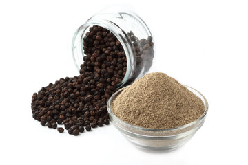 Indian spices - black pepper powder,Black pepper corns scattered on white background and Black pepper Powder on Glass bowl isolated on white background.