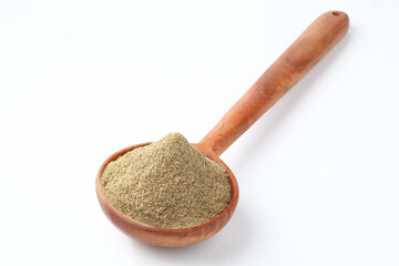 Indian spices Black Pepper powder in a wooden spoon with pepper corns on white background