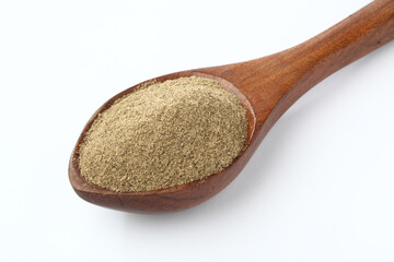 Indian spices Black Pepper powder in a wooden spoon with pepper corns on white background