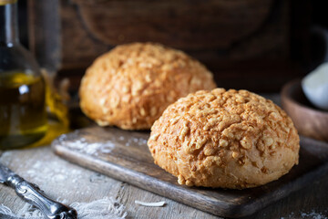 Homemade pastries with cheese on a rustic table