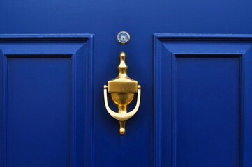 knocker on the  blue door