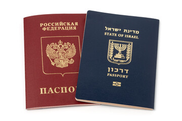 Israeli and russian international travel passports isolated on white background.