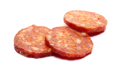 Salami sausage slices isolated on white