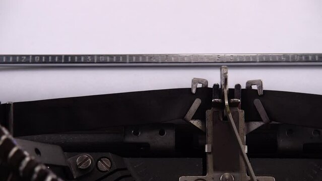 Typing phrase Russian airstrike on retro typewriter.