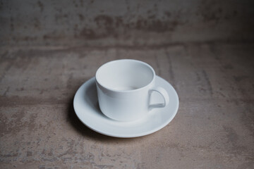  Empty white coffee cup with saucer. High quality photo