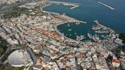 Aerial drone photo of iconic round shaped picturesque port of Mikrolimano with anchored sail boats...