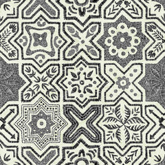 Seamless pattern in patchwork style. Embroidered bohemian print. Vector illustration.