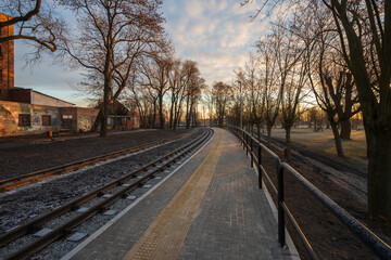 Fototapeta premium Żnin, Poland December 22, 2021 Tracks to the historic narrow-gauge railway in the city of Żnin. Tourist attraction.