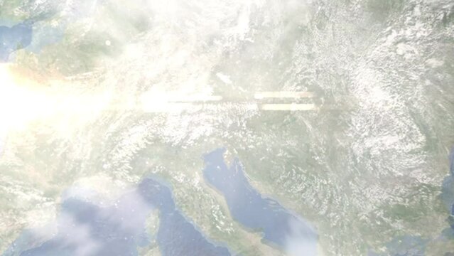 Earth zoom in from outer space to city. Zooming on Villach, Austria. The animation continues by zoom out through clouds and atmosphere into space. Images from NASA