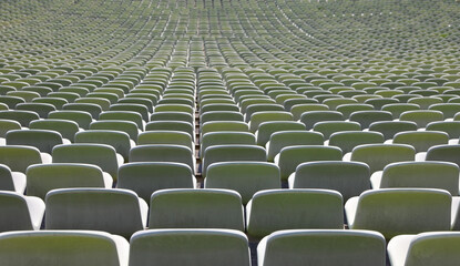 Obraz premium endless series of empty seats in the stadium