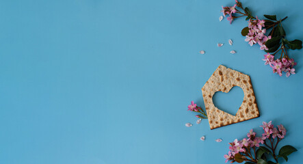 blue big banner Matzah shape of heart and house layout. Traditional of Jewish Holiday on Passover. Home symbol of lovely family. top view, layout. love and care. space for text