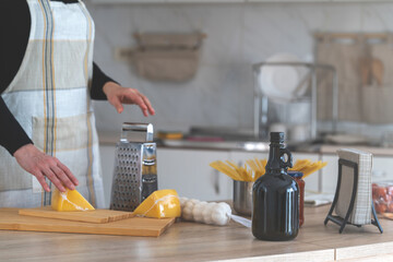 A bottle of the finest oil as a secret ingredient in the preparation of top dishes.Preparing a meal.