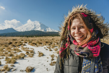 Closeup portrait of a female mountaineer in volcano popocatepetl, mexico