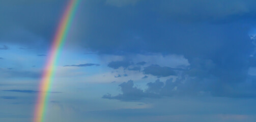 beautiful blue sky with rainbow in the evening as abstract background