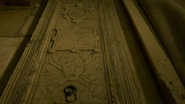 Tombstones on the floor of the Church of Saint Nicholas Muster on island Vis