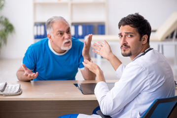Old male patient visiting young male doctor