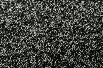 Black pores leather surface background texture.