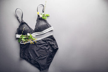 Set of female lace underwear and spring blossom. Wireless soft bra with high waist panties. Sexy...