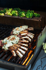 Grilled ribs on the flaming grill