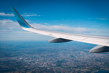 Airplane wing over london