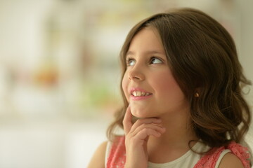 beautiful happy girl looking away indoors