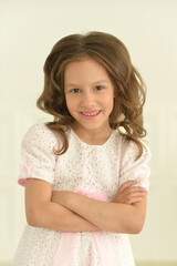 Fototapeta premium Portrait of cute girl smiling in studio