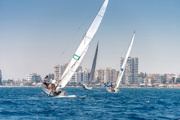 Sailboats on a turn near Larnaca coast, Cyprus