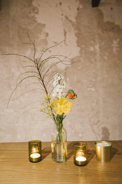 Flowers and candles for interior decoration