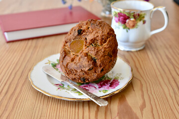 Simple tasty tea and muffin for breakfast or afternoon relaxing snack to enjoy with a good book.