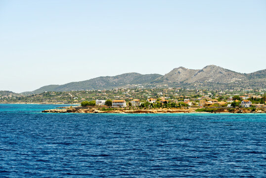 view from the deck of the ferry during sail in Greece. the Greek island Aegina on the background. close up