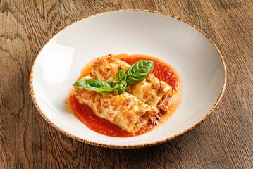 tasty lasagna with tomato sauce