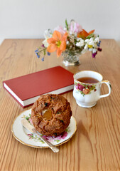 Simple tasty tea and muffin for breakfast or afternoon relaxing snack to enjoy with a good book.