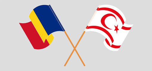 Crossed and waving flags of Romania and Northern Cyprus