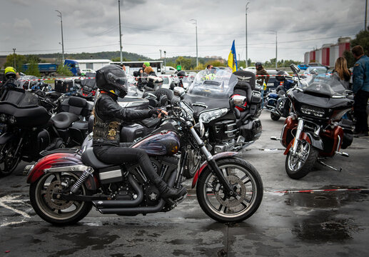 Nice lady biker on Harley Davidson bike at Crazy Hohols MFC closing season in Ukraine Kiev september 2021