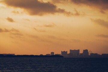 Fototapeta premium Sunset Silhouettes of a Coastal City