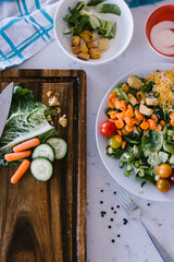 Freshly chopped vegetables for delicious lunch green salad